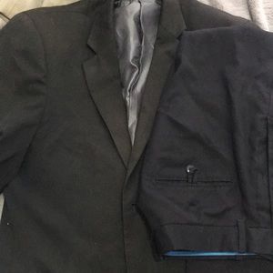 Suit (heavy wear, tear left elbow)